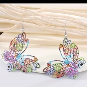 Crossbody purses various different b necklaces and earrings